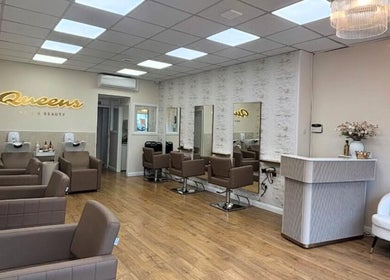 Modern chic interior of Sshh Hair at Poppys in Bristol, England, GB with stylish chairs and mirrors.