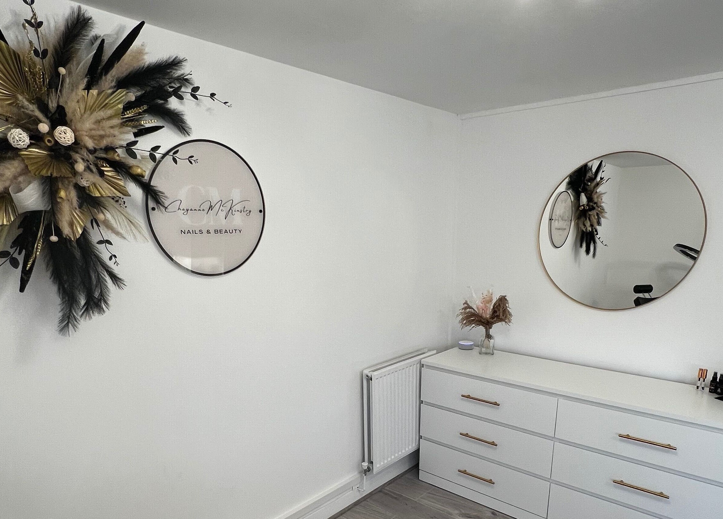 Sophisticated interior of CM Nails & Beauty in Bridge Of Allan, Scotland, GB, featuring a chic wall display.