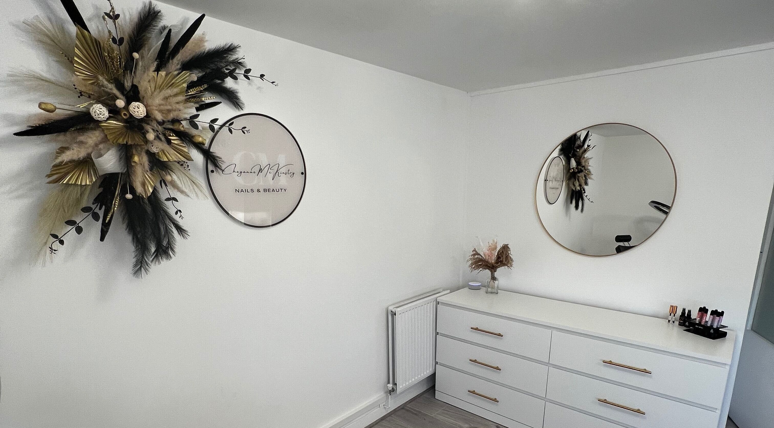 Sophisticated interior of CM Nails & Beauty in Bridge Of Allan, Scotland, GB, featuring a chic wall display.