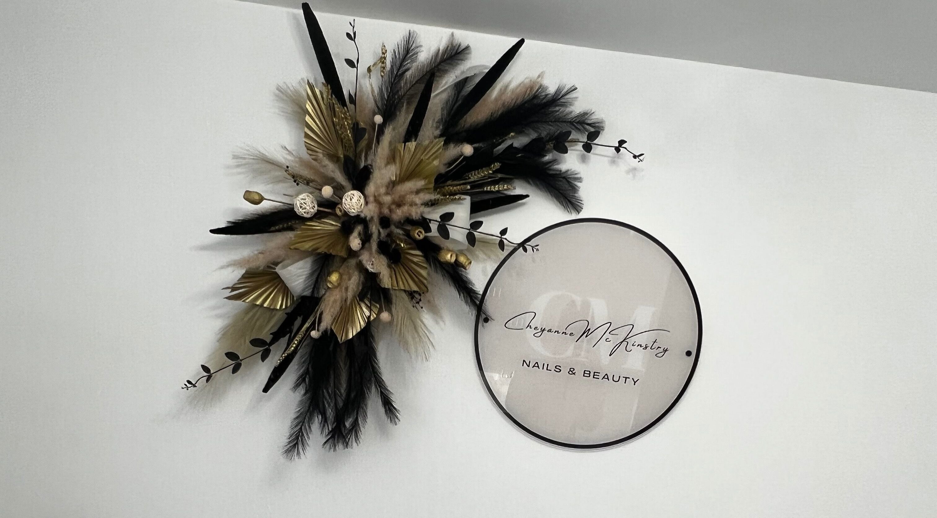 Sophisticated wall art at CM Nails & Beauty, Bridge Of Allan, Scotland, GB showcasing stylish design.