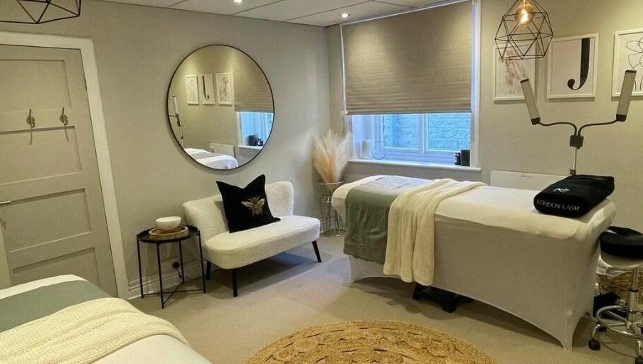 Relaxing treatment room at The Lash Clinic Huddersfield, Huddersfield, England, GB with modern decor and comfortable seating.