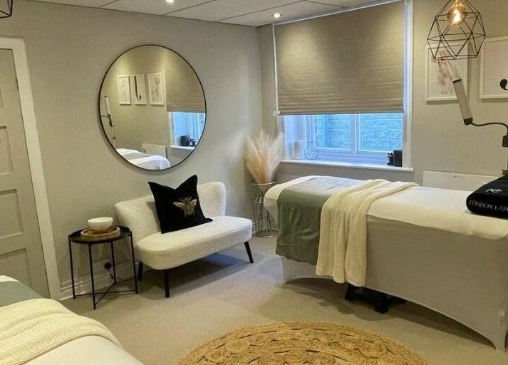 Relaxing treatment room at The Lash Clinic Huddersfield, Huddersfield, England, GB with modern decor and comfortable seating.