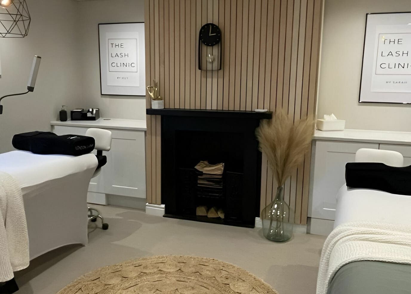 Elegant treatment room at The Lash Clinic Huddersfield, England, GB with modern decor and comfortable beds.