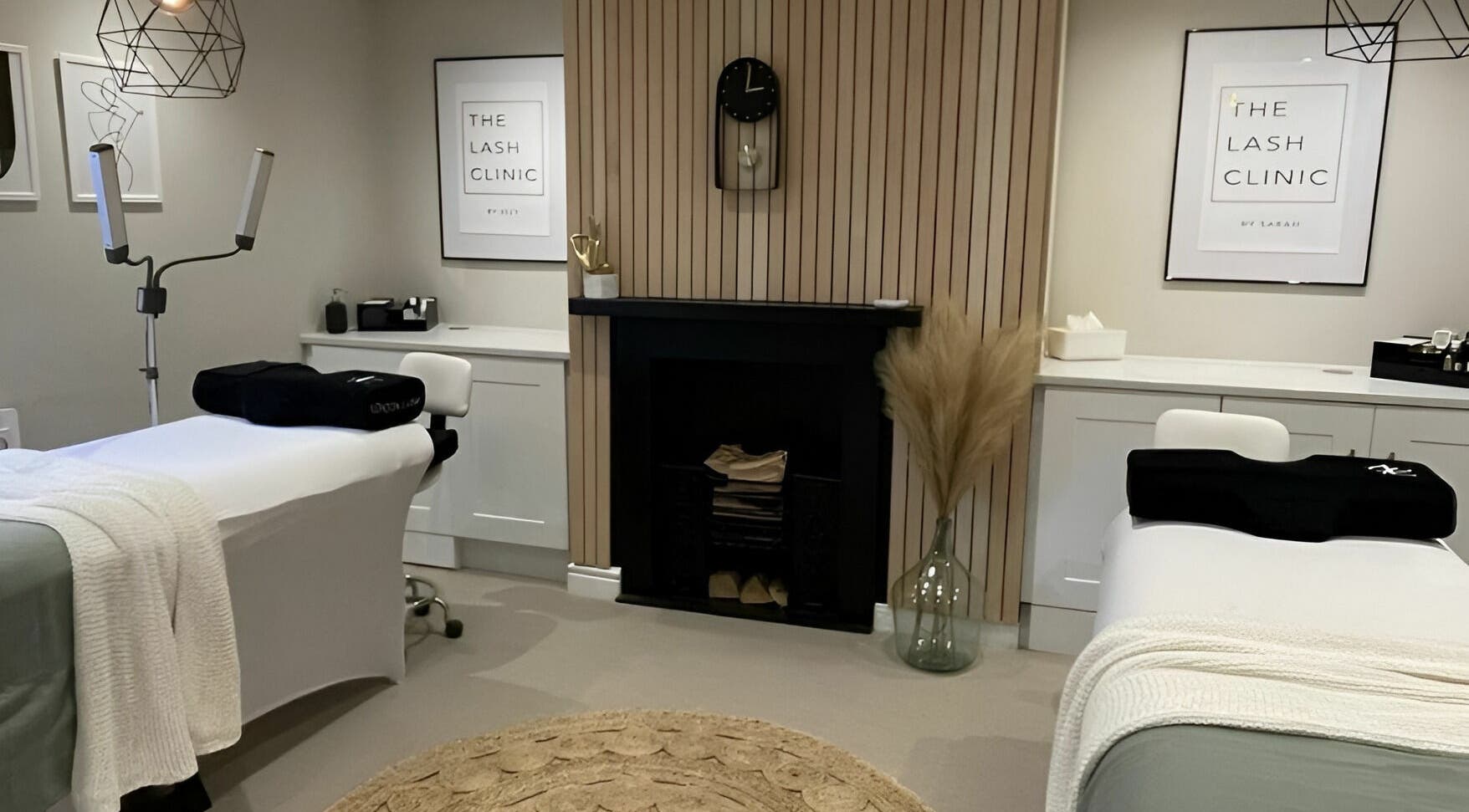 Elegant treatment room at The Lash Clinic Huddersfield, England, GB with modern decor and comfortable beds.