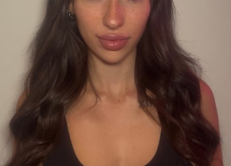 Elegant woman with styled hair at KiKi Glam and Co, Melbourne, Victoria, AU.