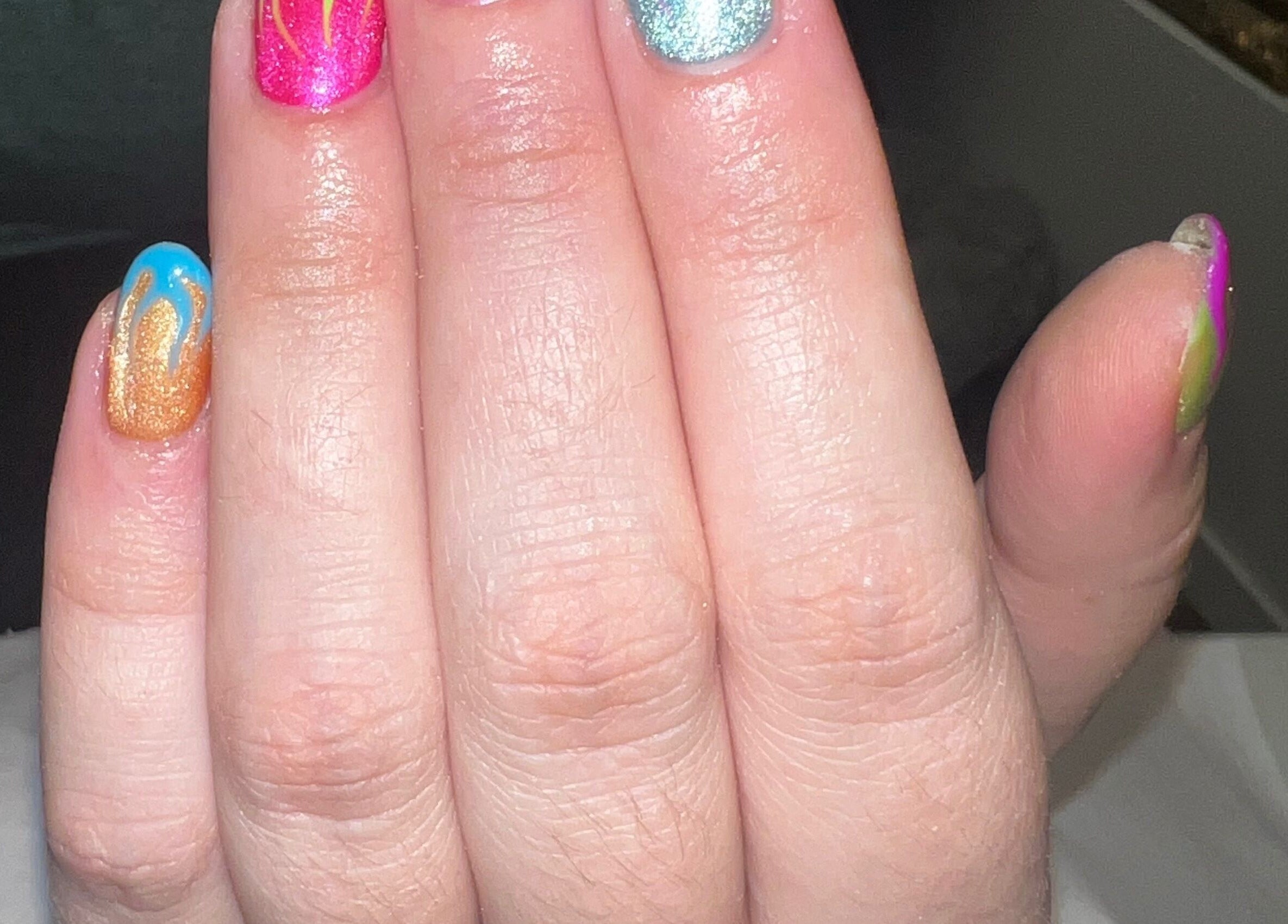 Colorful nail art design at Beauty at Dee’s, Newcastle upon Tyne, England, GB showcasing vibrant creativity.