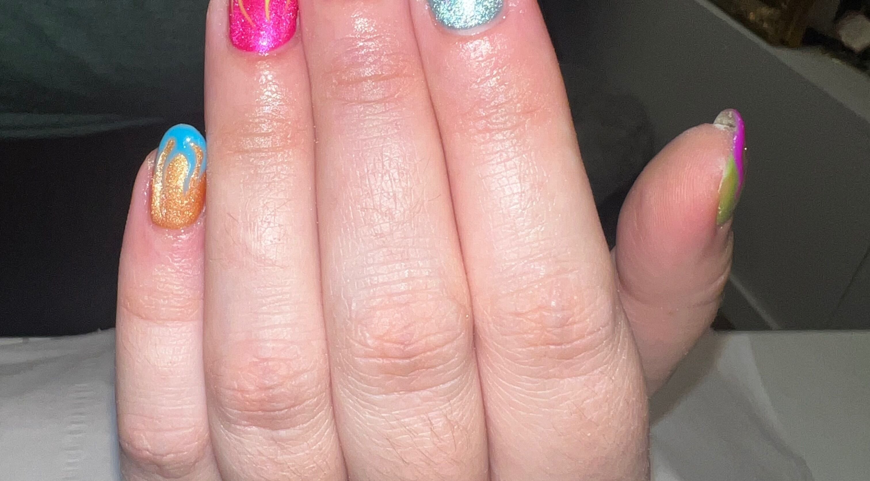 Colorful nail art design at Beauty at Dee’s, Newcastle upon Tyne, England, GB showcasing vibrant creativity.