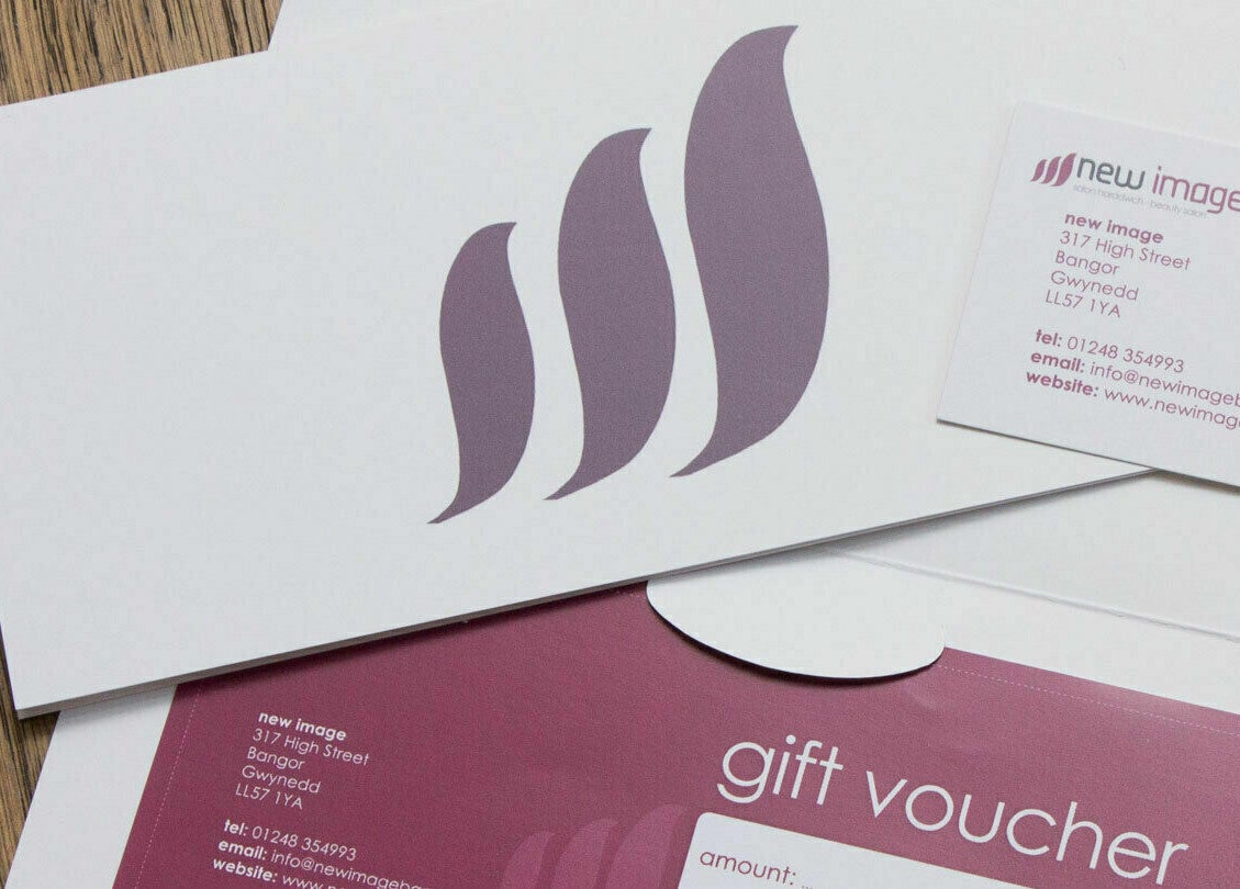 New Image gift voucher and business card in Bangor, Wales, GB with graceful logo design.