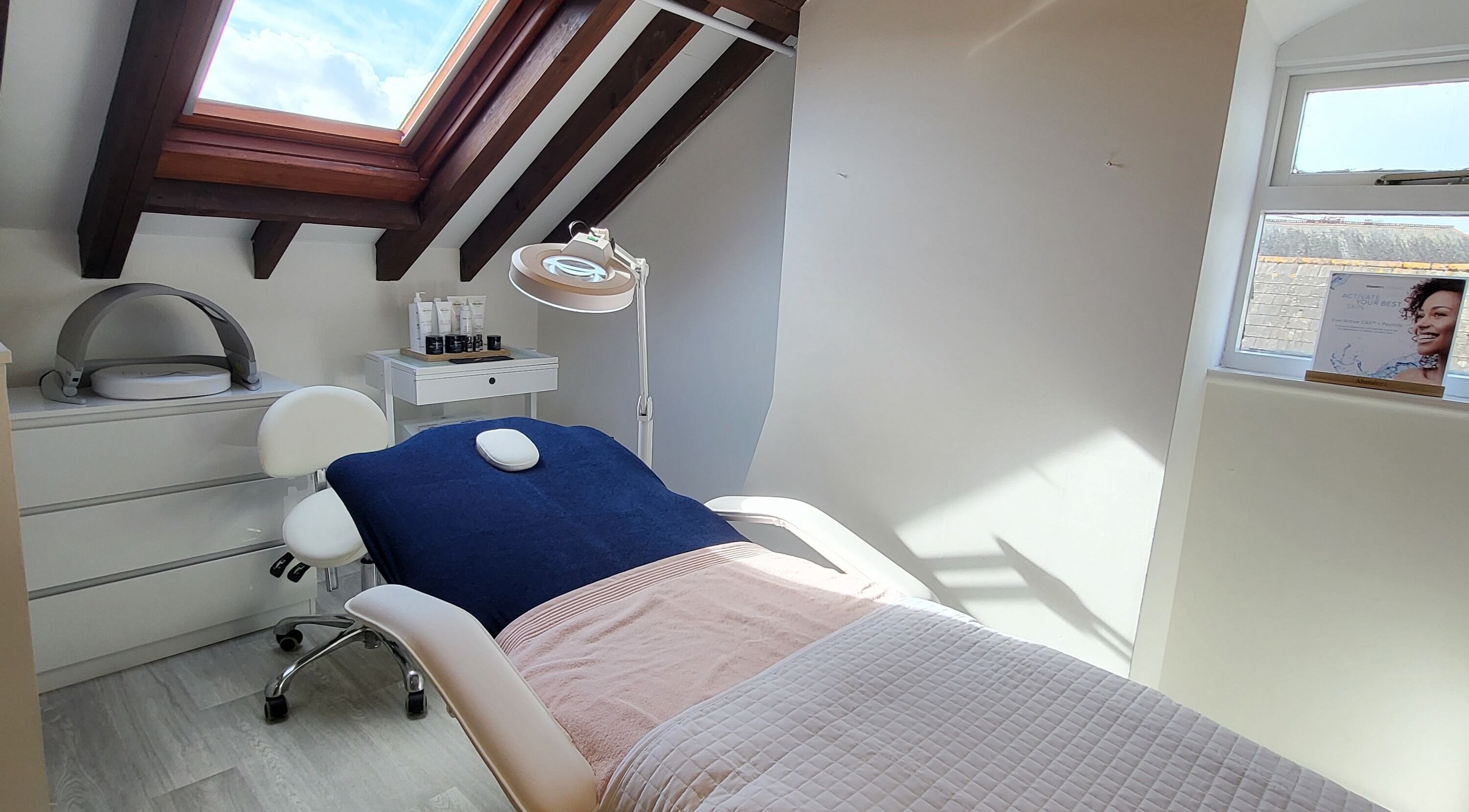 Relaxing treatment room under skylight at The Skin Care Clinic, Taunton, England, GB.