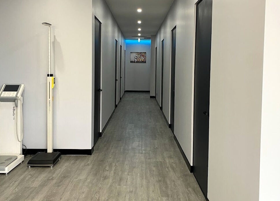 A calming hallway at The Wellness Hub - Macarthur in Mount Annan, New South Wales, AU, showcasing modern decor.