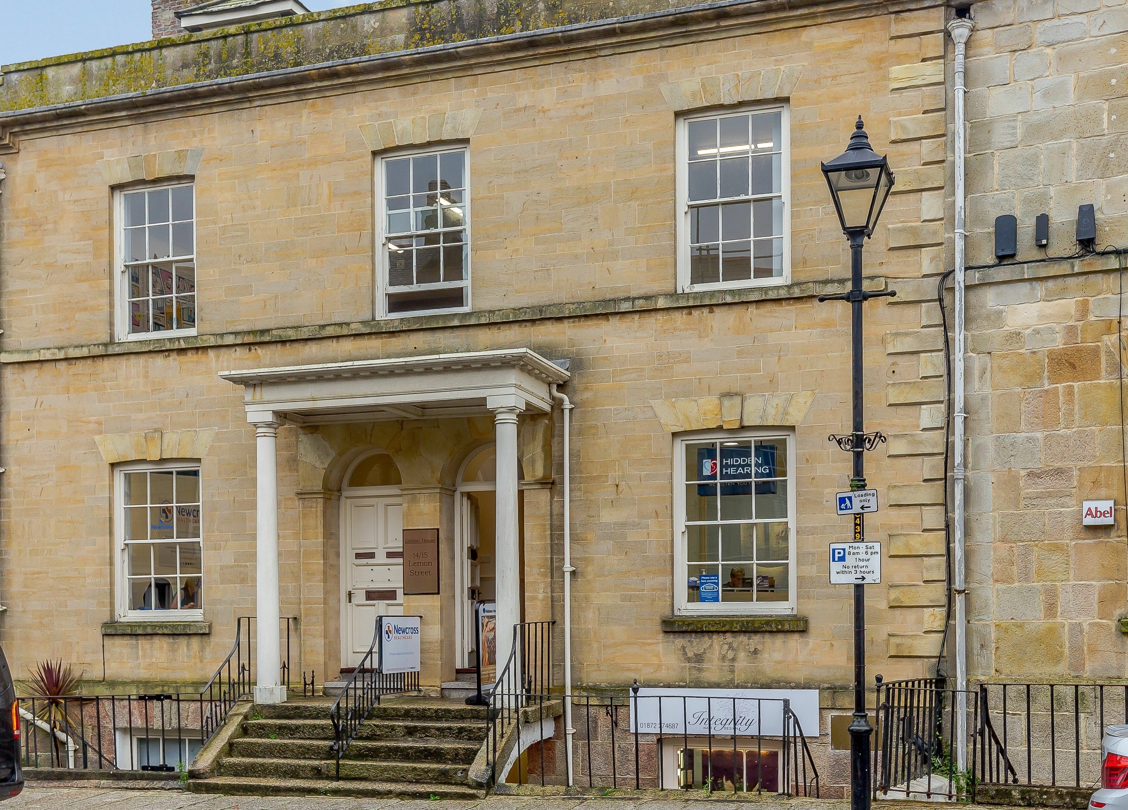 Front view of Integrity Hair Design at 19 Lemon Street, Truro, England, GB in an elegant historic building.