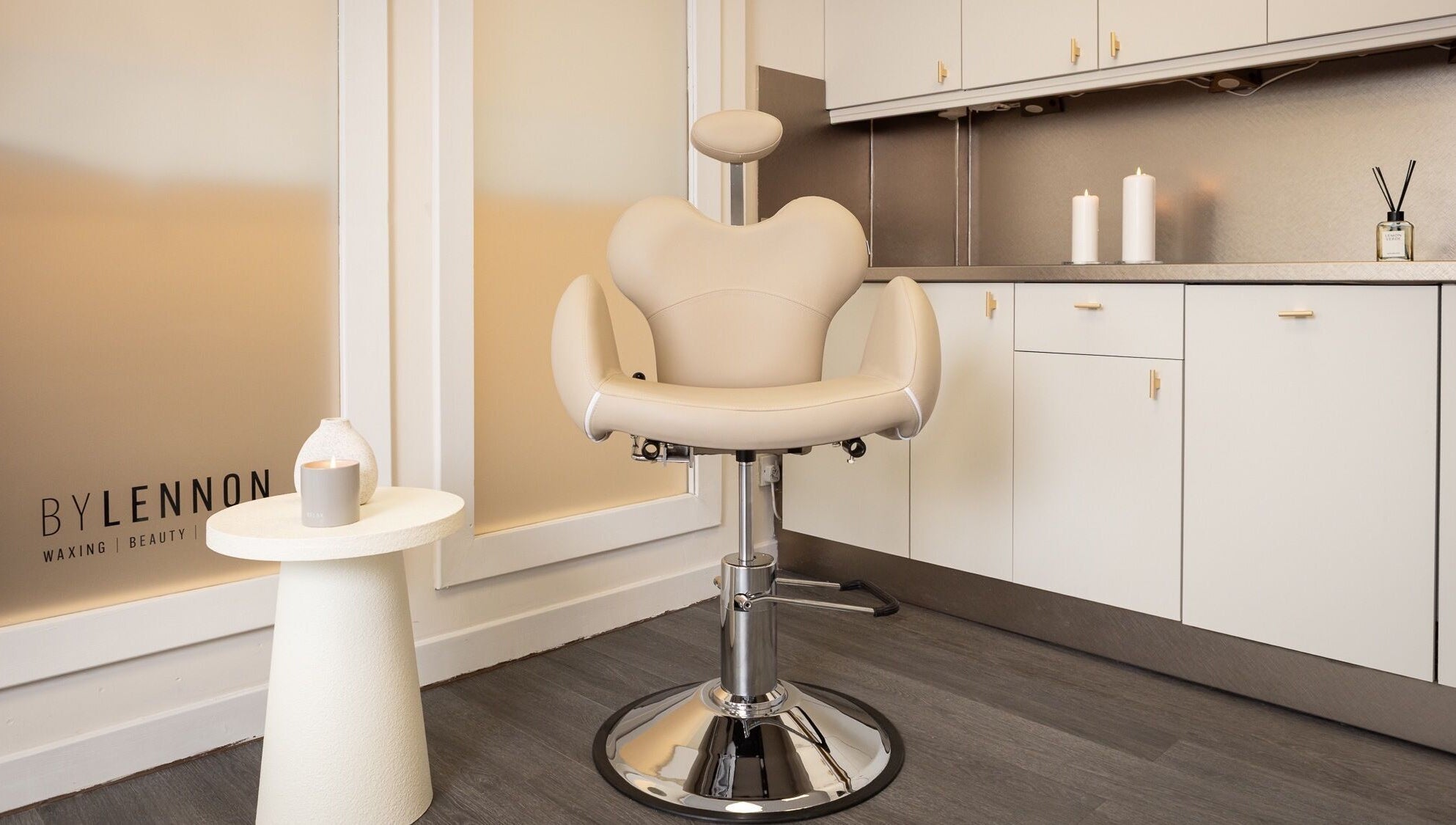 Luxurious salon chair at By Lennon Beauty & Waxing, Edinburgh, Scotland, GB offering premium wellness services.