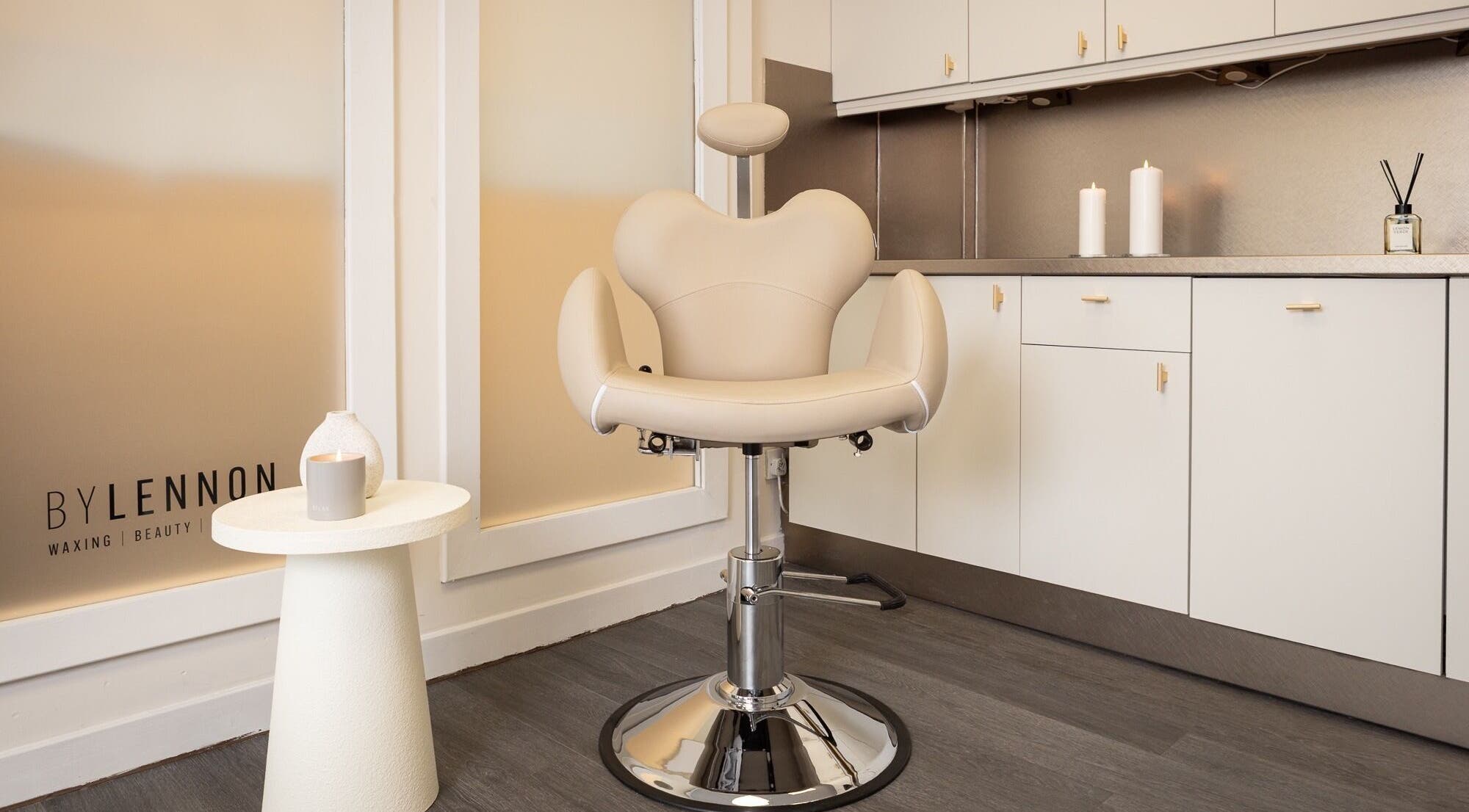 Luxurious salon chair at By Lennon Beauty & Waxing, Edinburgh, Scotland, GB offering premium wellness services.