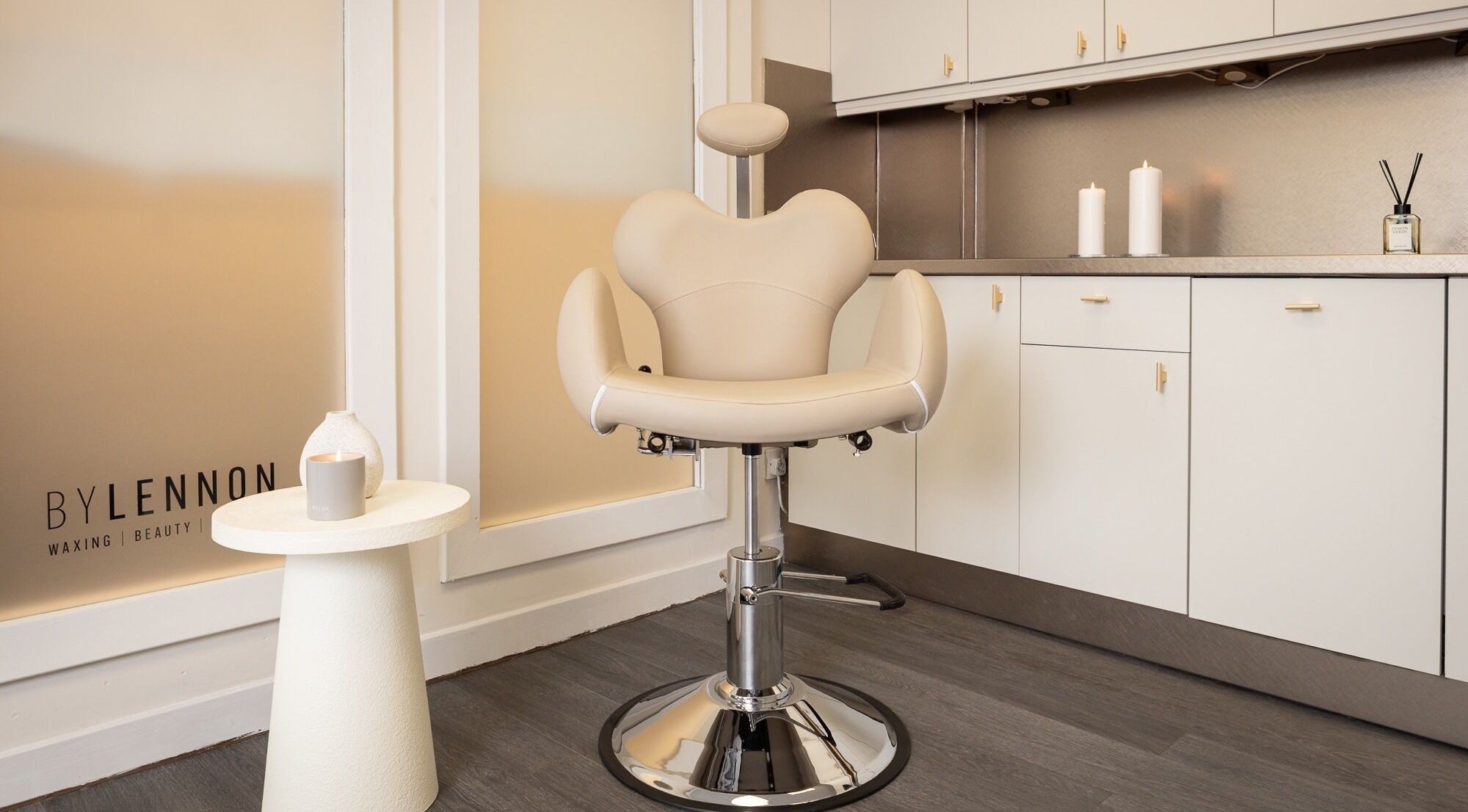 Luxurious salon chair at By Lennon Beauty & Waxing, Edinburgh, Scotland, GB offering premium wellness services.