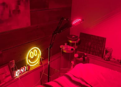 Elevate Wellness - Allison Best, LMT in Belpre, Ohio, US, featuring a cozy room with red lighting and decor.