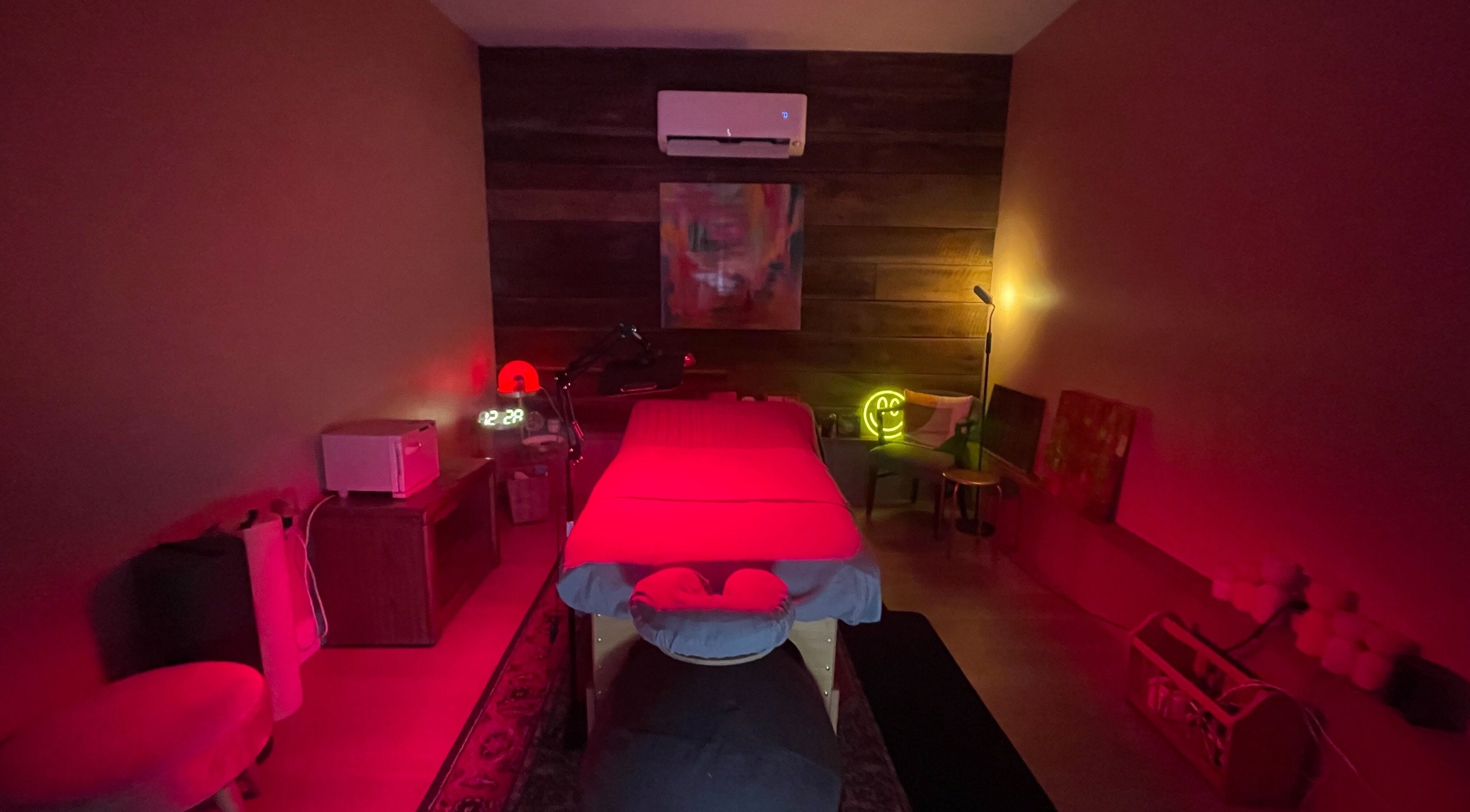 Peaceful massage room at Elevate Wellness - Allison Best, LMT in Belpre, Ohio, US with ambient lighting.