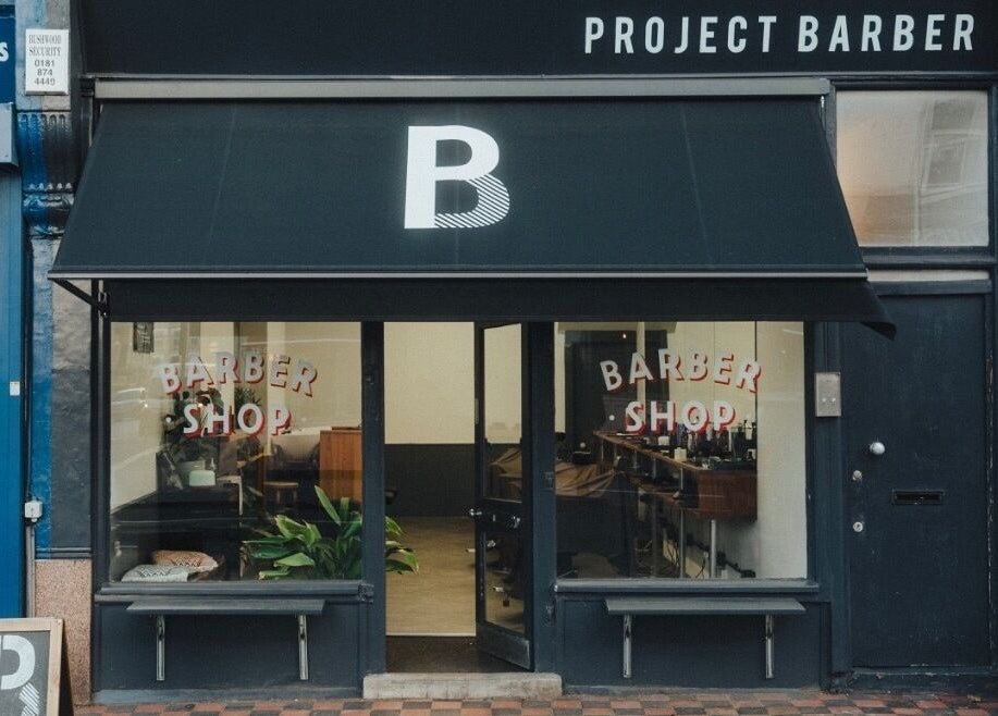 Front view of Project Barber shop in London, England, GB, showcasing modern and inviting exterior façade.