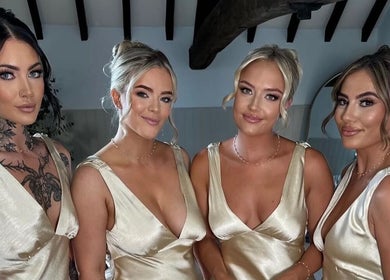 Elegant women in gold dresses at Izabella Fivey Makeup, Coventry, England, GB.