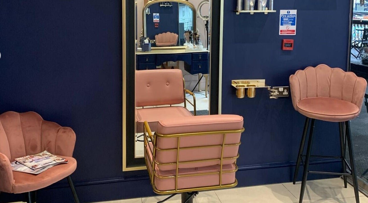 Elegant salon chairs at Hair By Lucy Jayne in Chester, England, GB, featuring a stylish and luxurious interior.