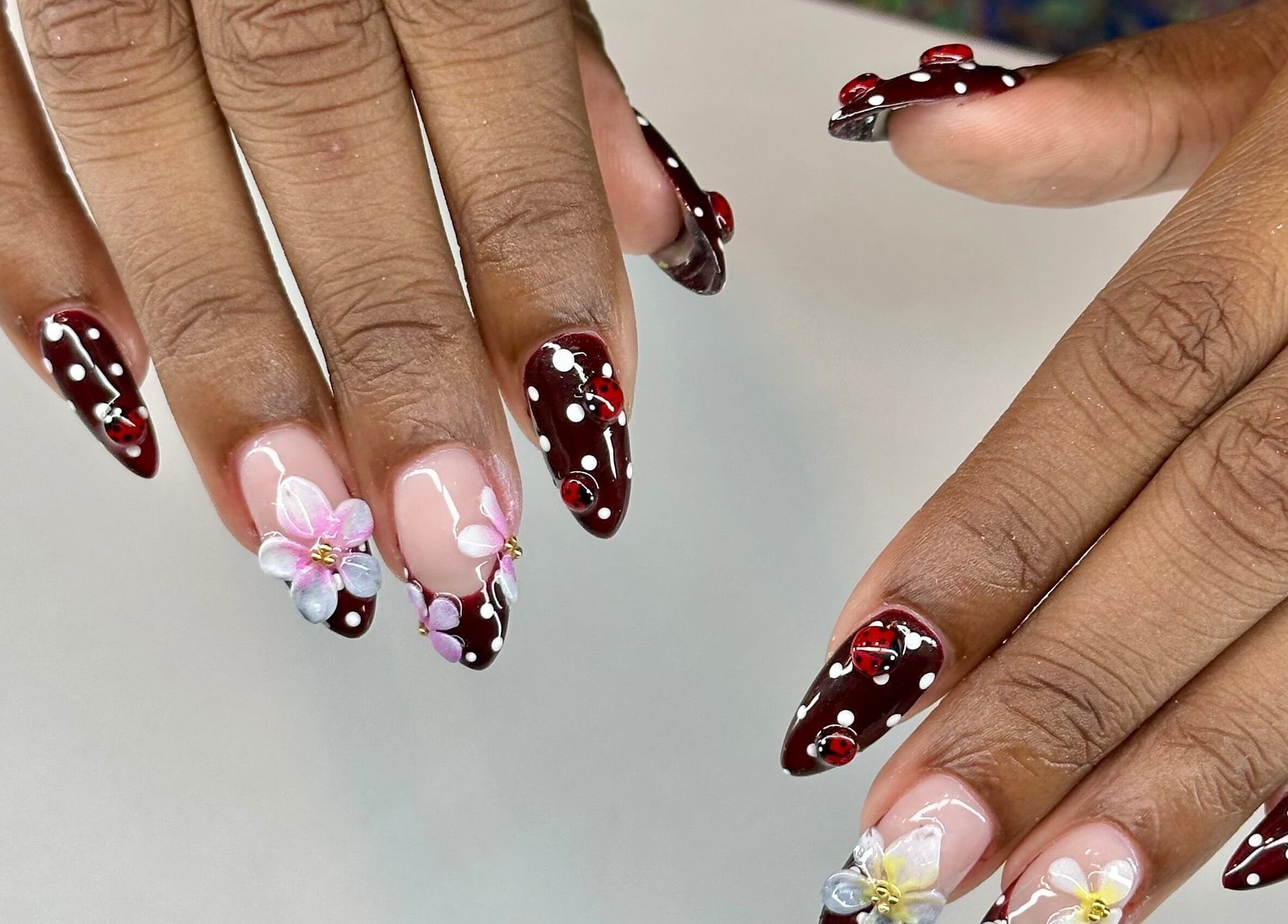 Elegant floral nail art at WinWin Nails and Spa, Windermere, Florida, US. Perfect for a stylish look.