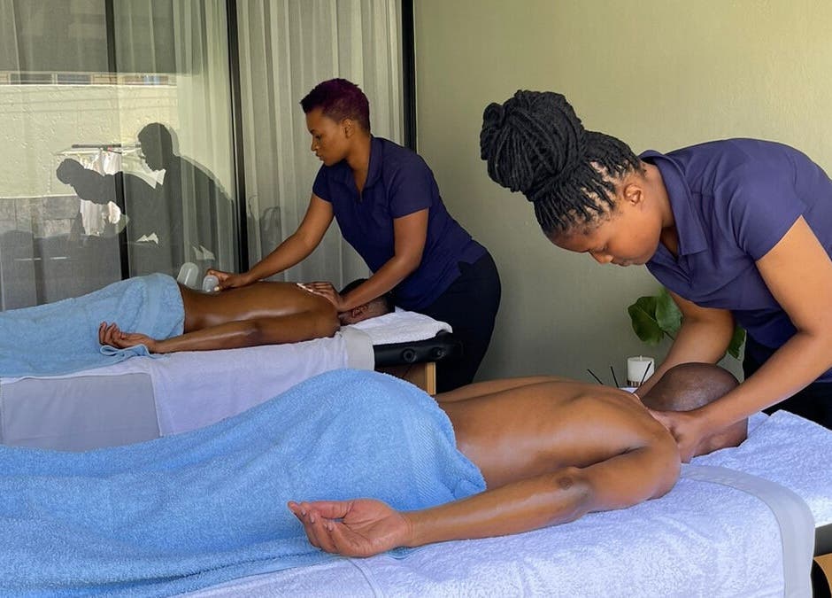 Professional therapists giving a massage at Emihle Wellness & Mobile Spa, Berea, Kwazulu-natal, ZA.