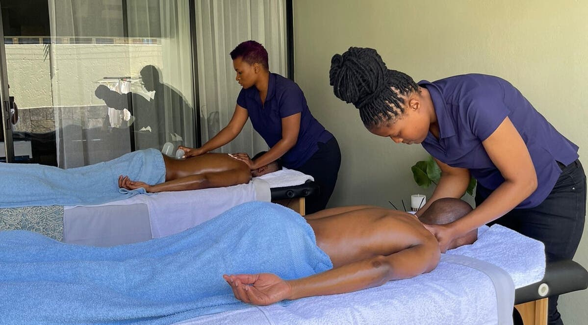 Professional therapists giving a massage at Emihle Wellness & Mobile Spa, Berea, Kwazulu-natal, ZA.