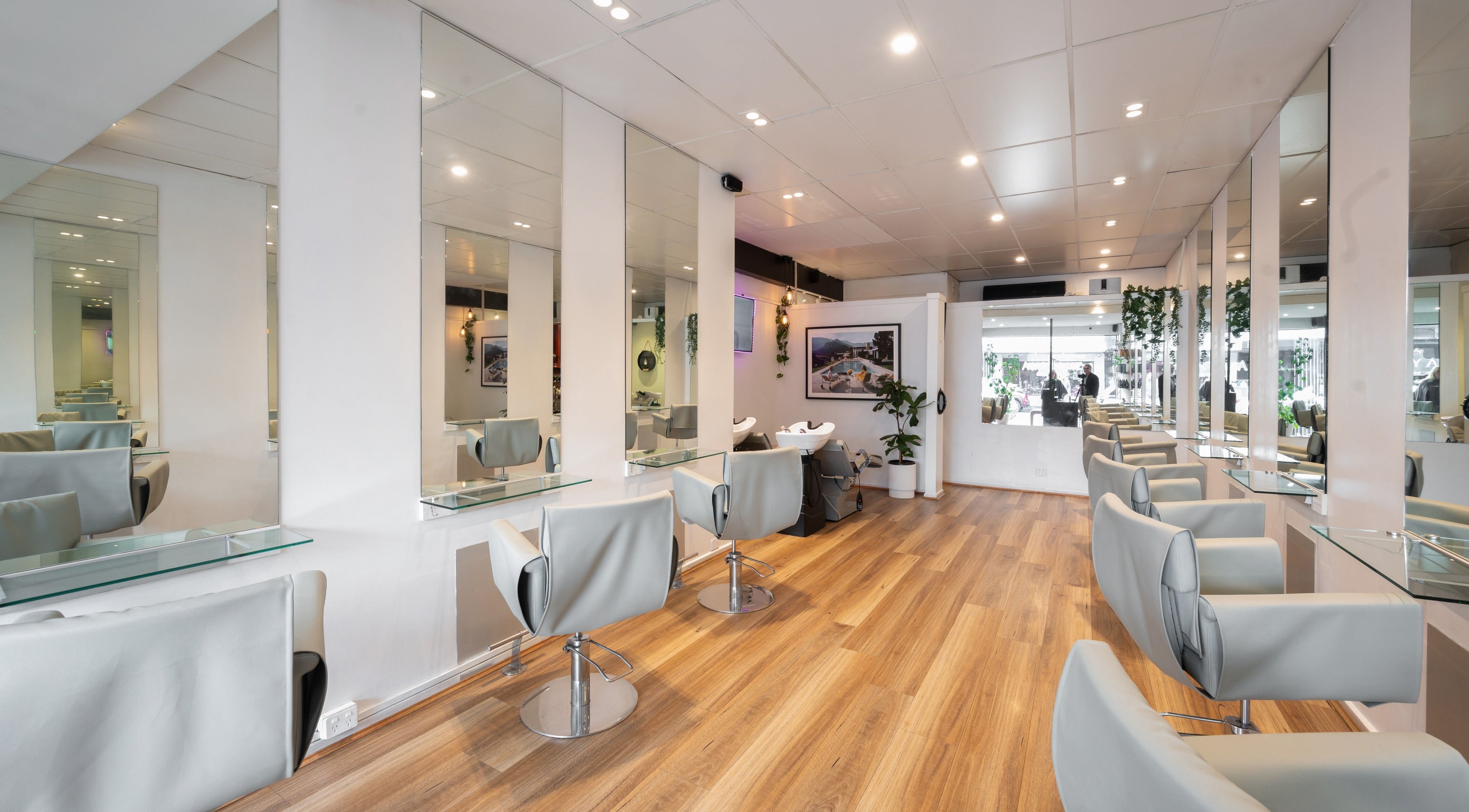 Modern interior of Ambyanz Organic Hair, Melbourne, Victoria, AU, showcasing mirrored styling stations.