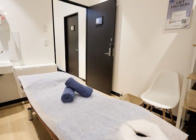 Zen Japanese Massage room with massage table and sink at North Shore Health Hub, St Leonards, New South Wales, AU.