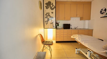 Tranquil massage room at Zen Japanese Massage - Enmore, Enmore, New South Wales, AU with a cozy bed.