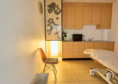 Relaxing massage room at Zen Japanese Massage - Enmore, Enmore, New South Wales, AU with soft lighting and decor.