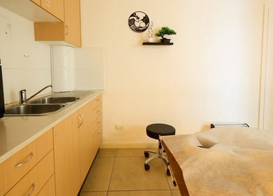 Cozy massage room at Zen Japanese Massage - Enmore, New South Wales, AU, featuring a serene decor.