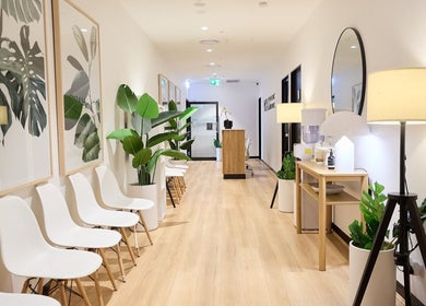 Zen Japanese Massage - North Shore Health Hub tranquil hallway with modern seating and decor, St Leonards, NSW, AU.