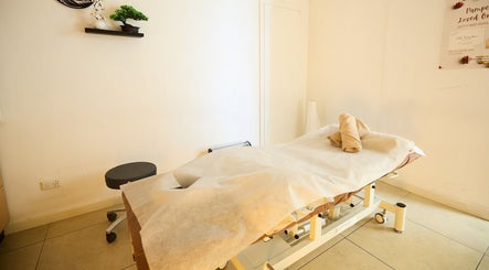 Tranquil massage room at Zen Japanese Massage - Enmore in New South Wales, AU, featuring a comfortable massage table.