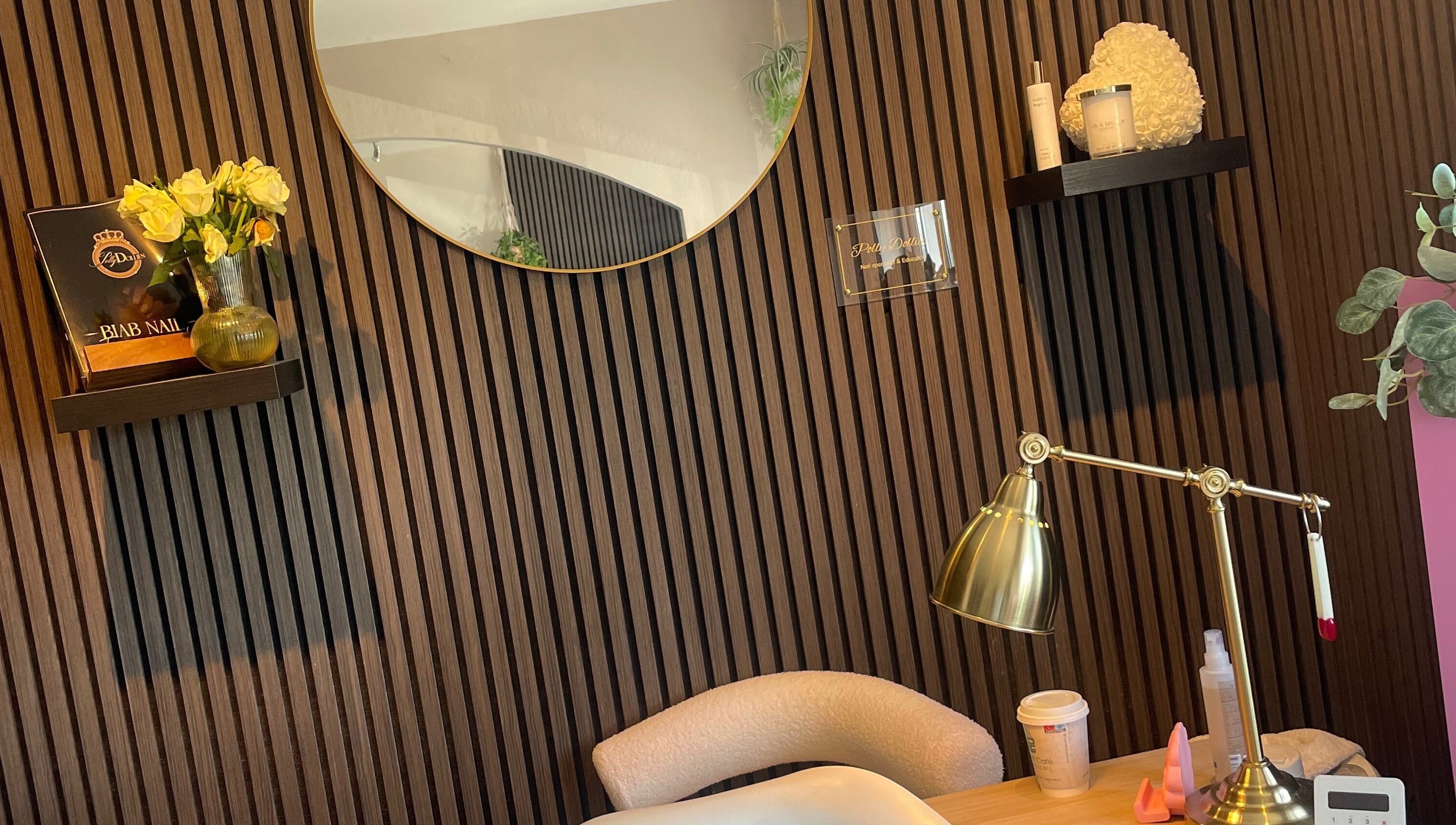 Sophisticated salon corner at Pollydollies, Dublin, County Dublin, IE, with stylish decor and soft lighting.