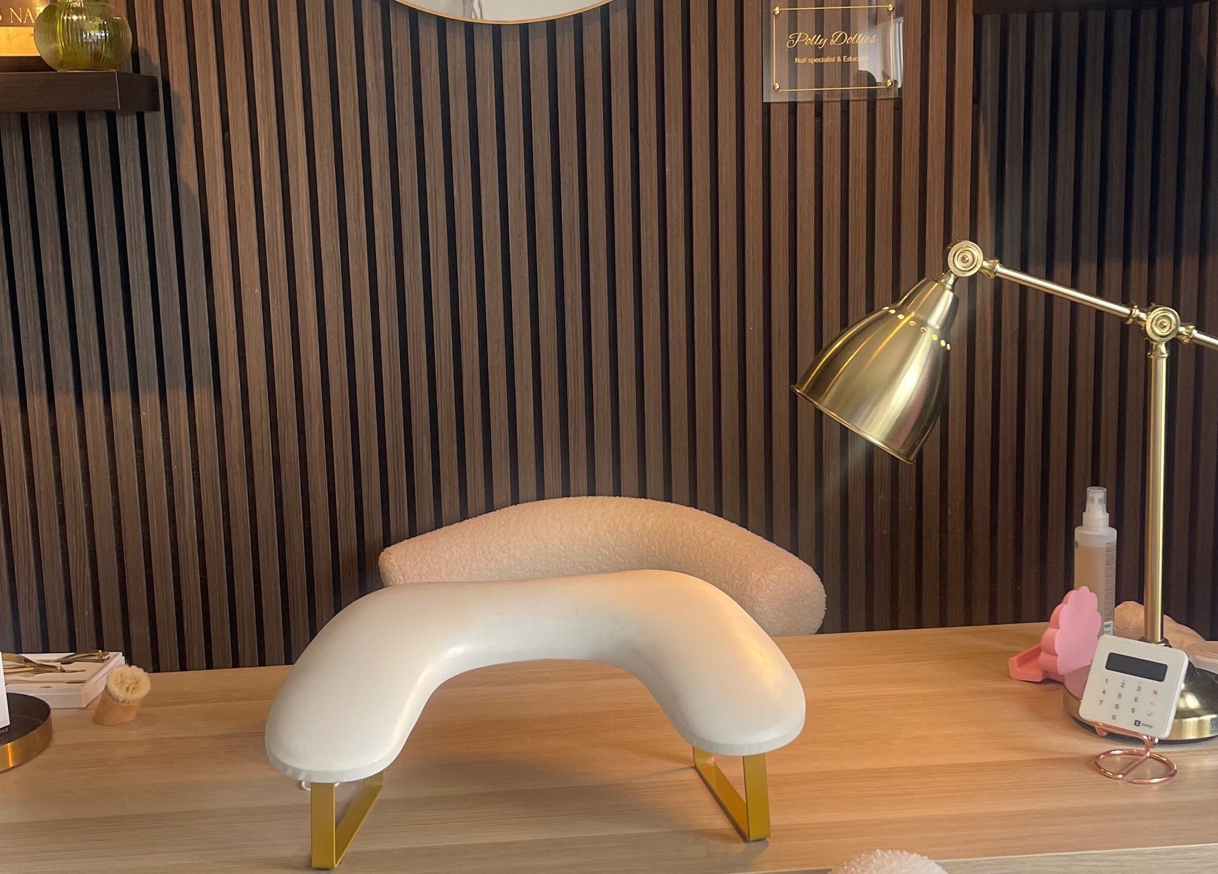 Pollydollies nail treatment desk in Dublin, County Dublin, IE with elegant decor and lamp.