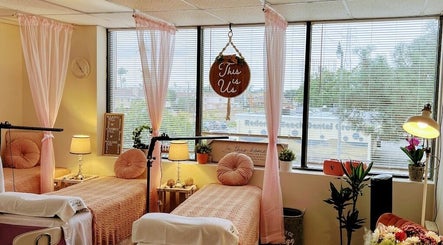 Cozy interior of YV LASHES & BROWS in Redondo Beach, California, US featuring two lash beds and elegant decor.