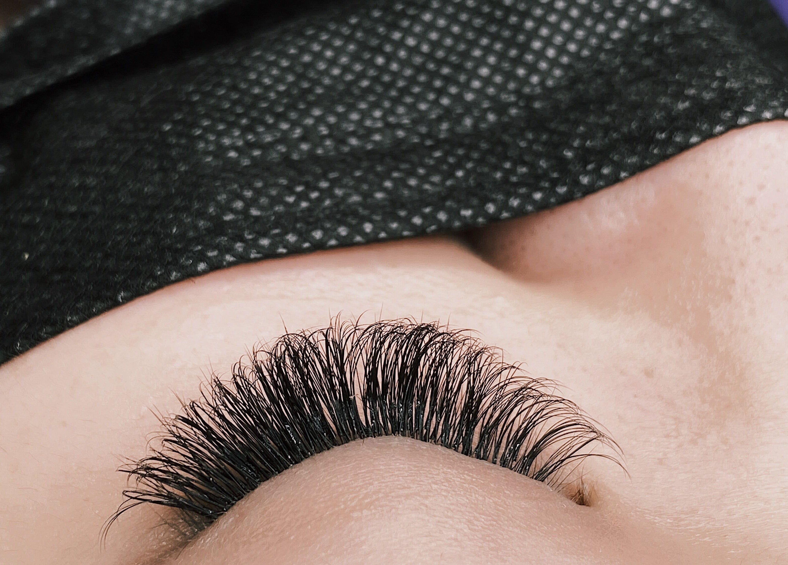 Close-up of luxurious lash extensions at YV LASHES & BROWS, Redondo Beach, California, US.