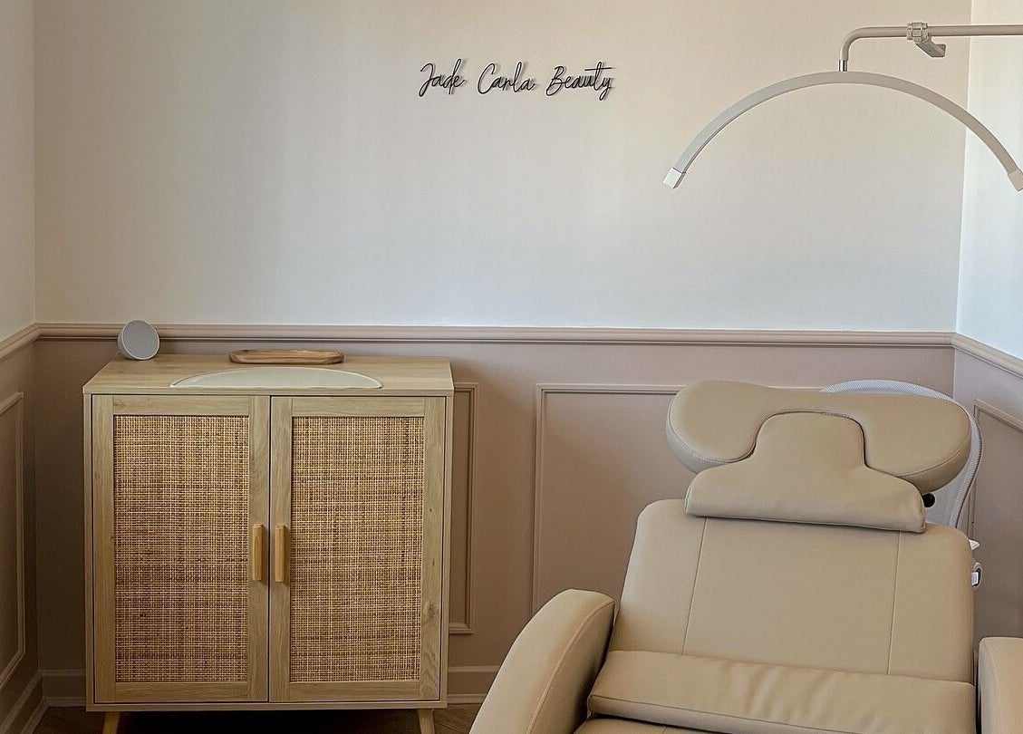 Modern treatment room at Jade Carla Beauty, Southport, England, GB. Features a comfortable, stylish chair and elegant decor.