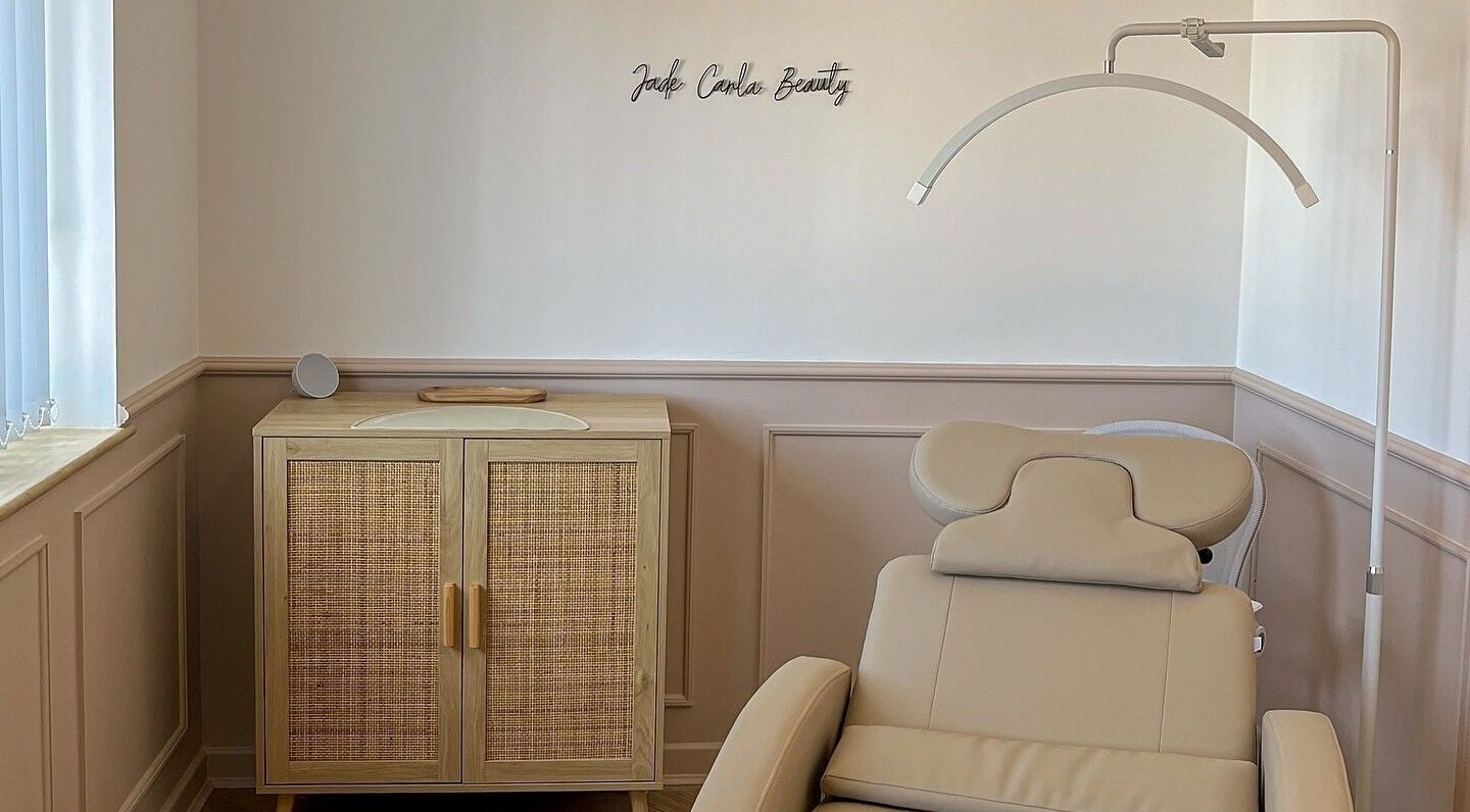 Modern treatment room at Jade Carla Beauty, Southport, England, GB. Features a comfortable, stylish chair and elegant decor.