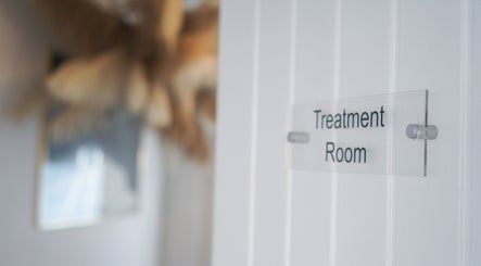 Calm treatment room sign at Iridescent, Guisborough, England, GB welcoming relaxation and wellness.