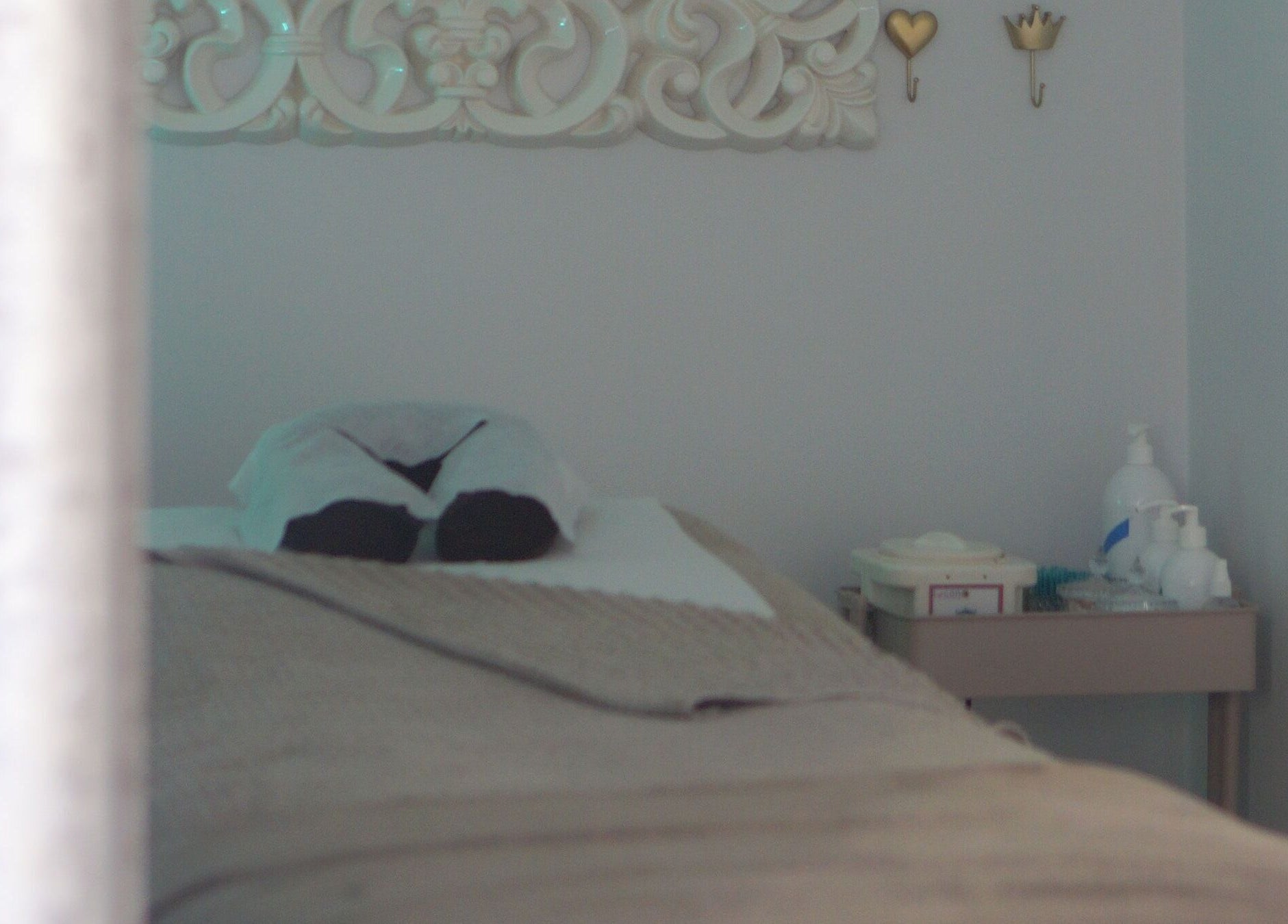 Cozy massage table at Iridescent, Guisborough, England, GB, ready for a relaxing spa treatment.