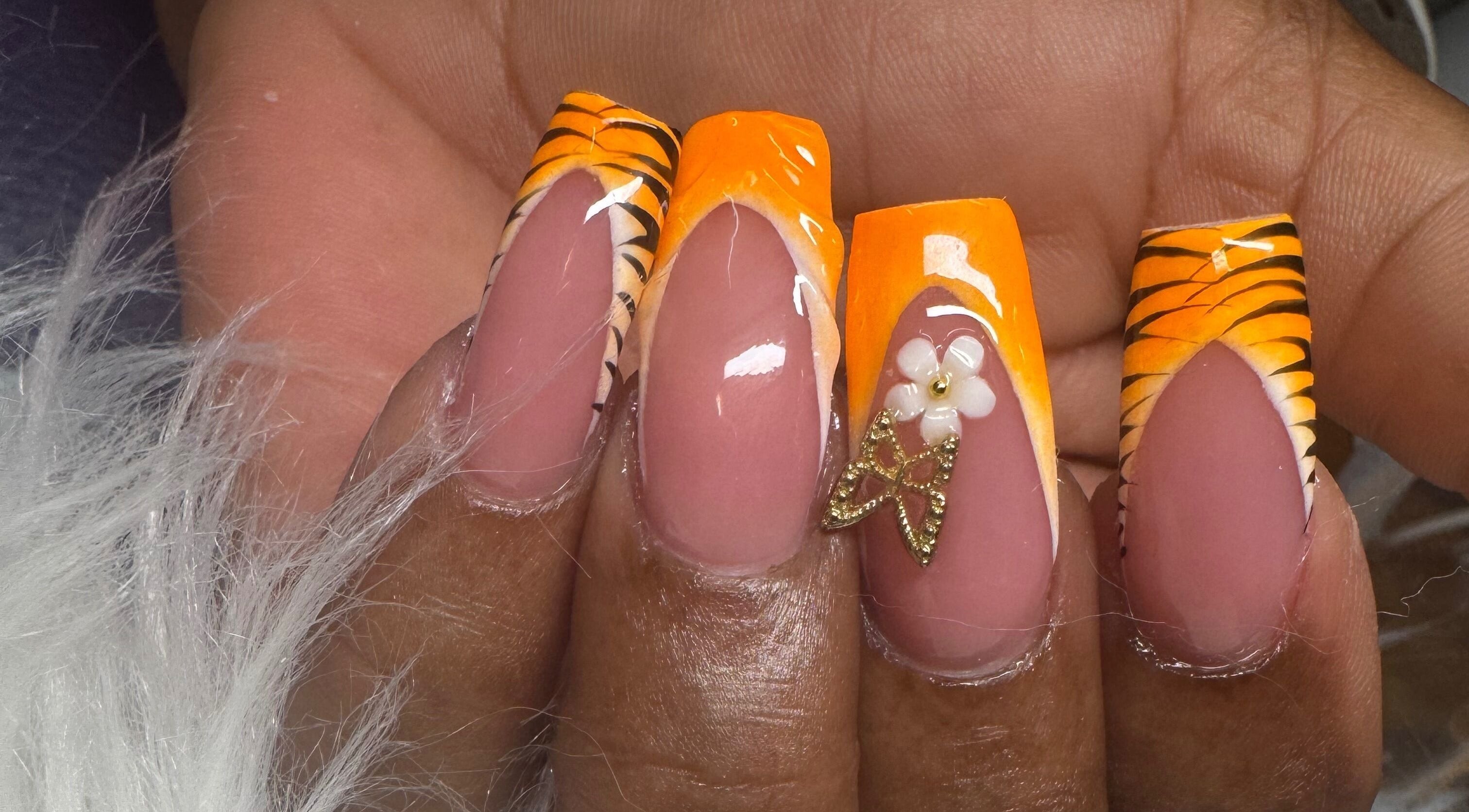 Vibrant nail art with orange and gold accents at Radiantnails.bb, ST.Patricks, Christ Church, BB.