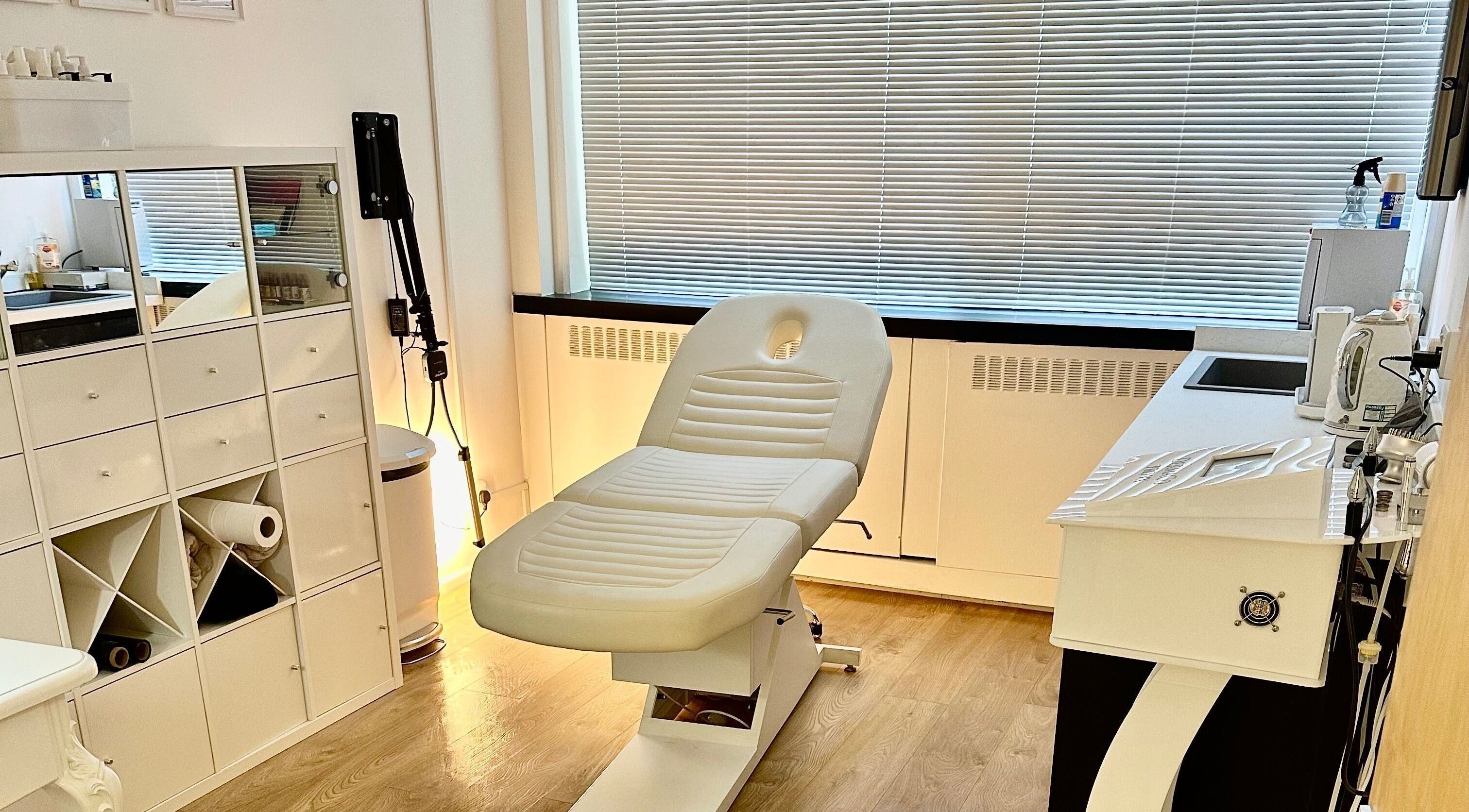 Luxurious treatment room at Cotswold Skin Studio, Cheltenham, England, GB, featuring modern equipment.