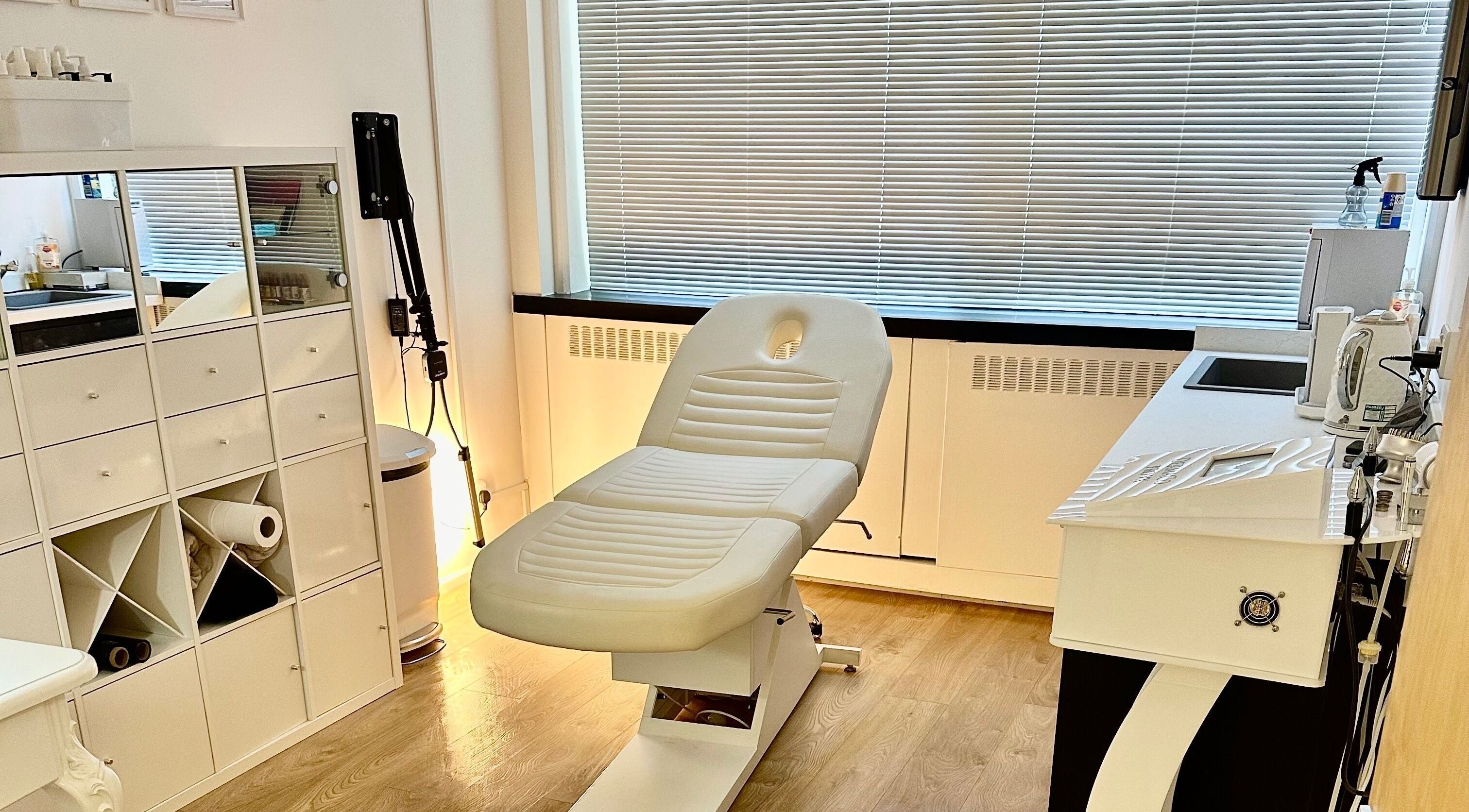 Luxurious treatment room at Cotswold Skin Studio, Cheltenham, England, GB, featuring modern equipment.