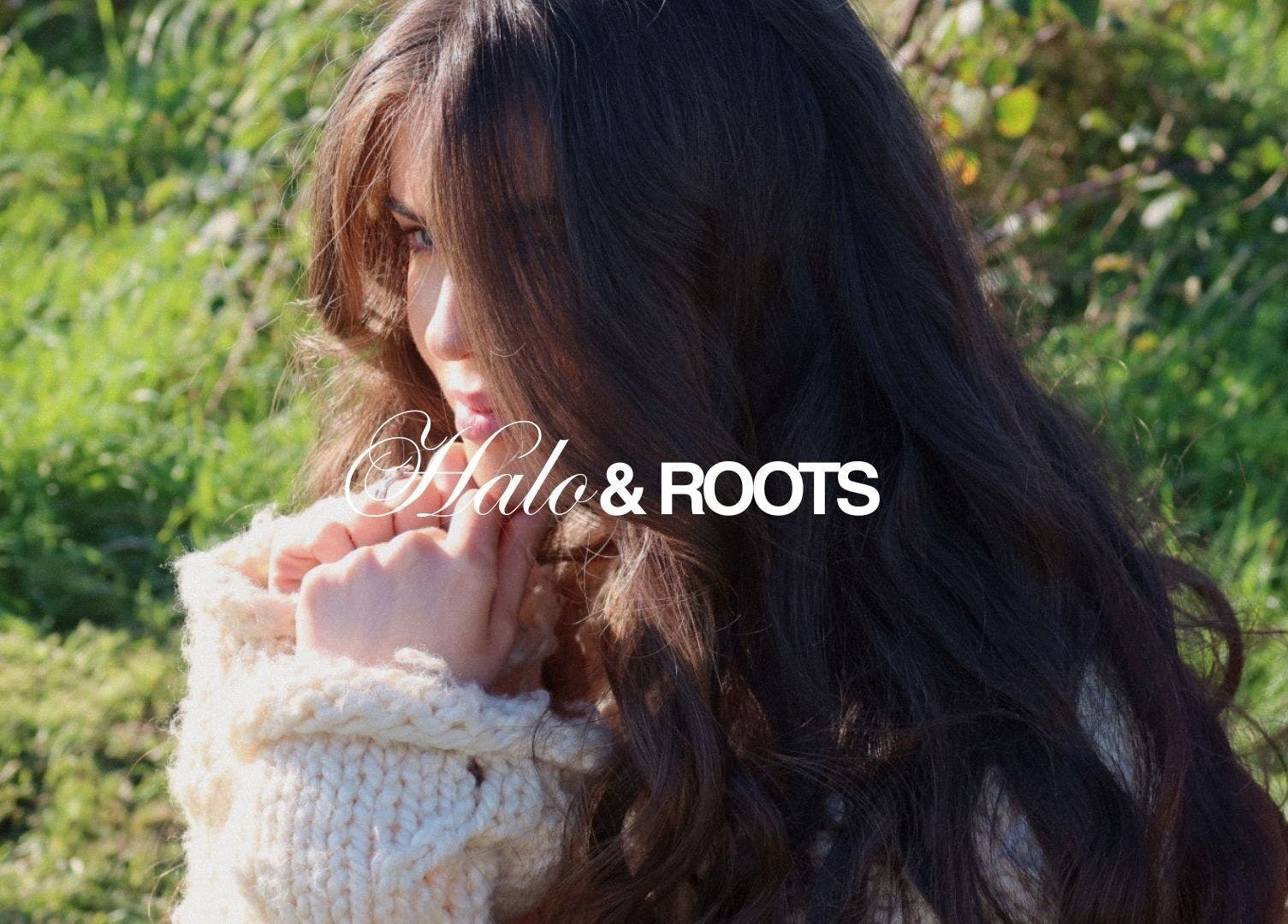 Woman with long hair at Halo & Roots, Kildare, County Kildare, IE, enjoying peaceful nature ambiance.