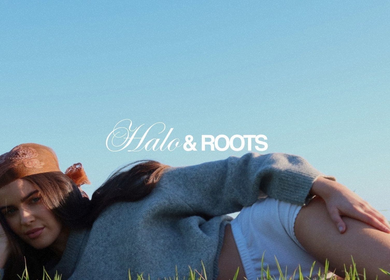 Woman relaxing in a meadow represents tranquility at Halo & Roots, Kildare, County Kildare, IE.