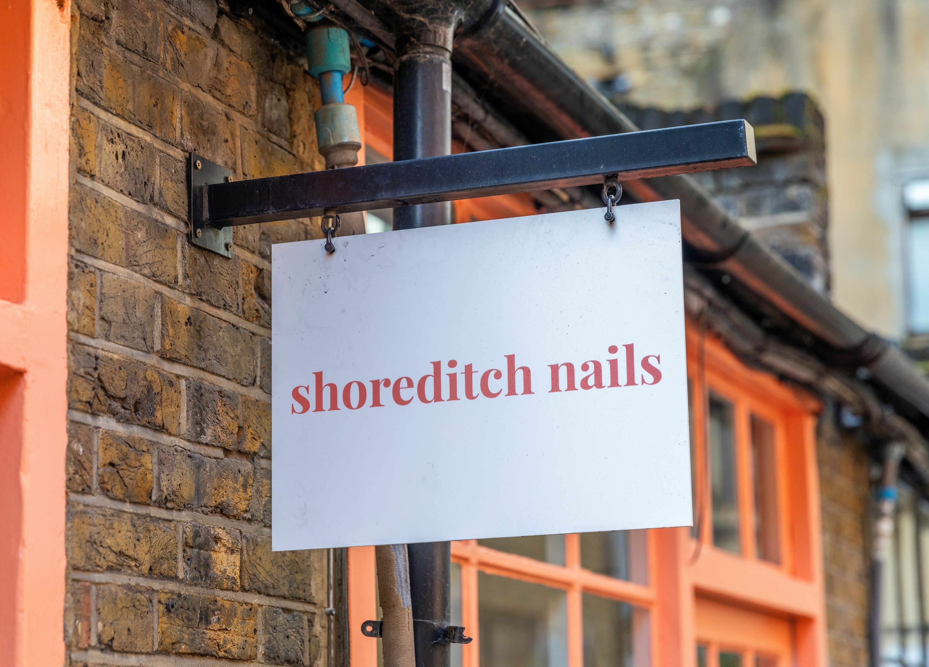 Exterior sign of Shoreditch Nails Shoreditch, London, England, GB with stylish design.