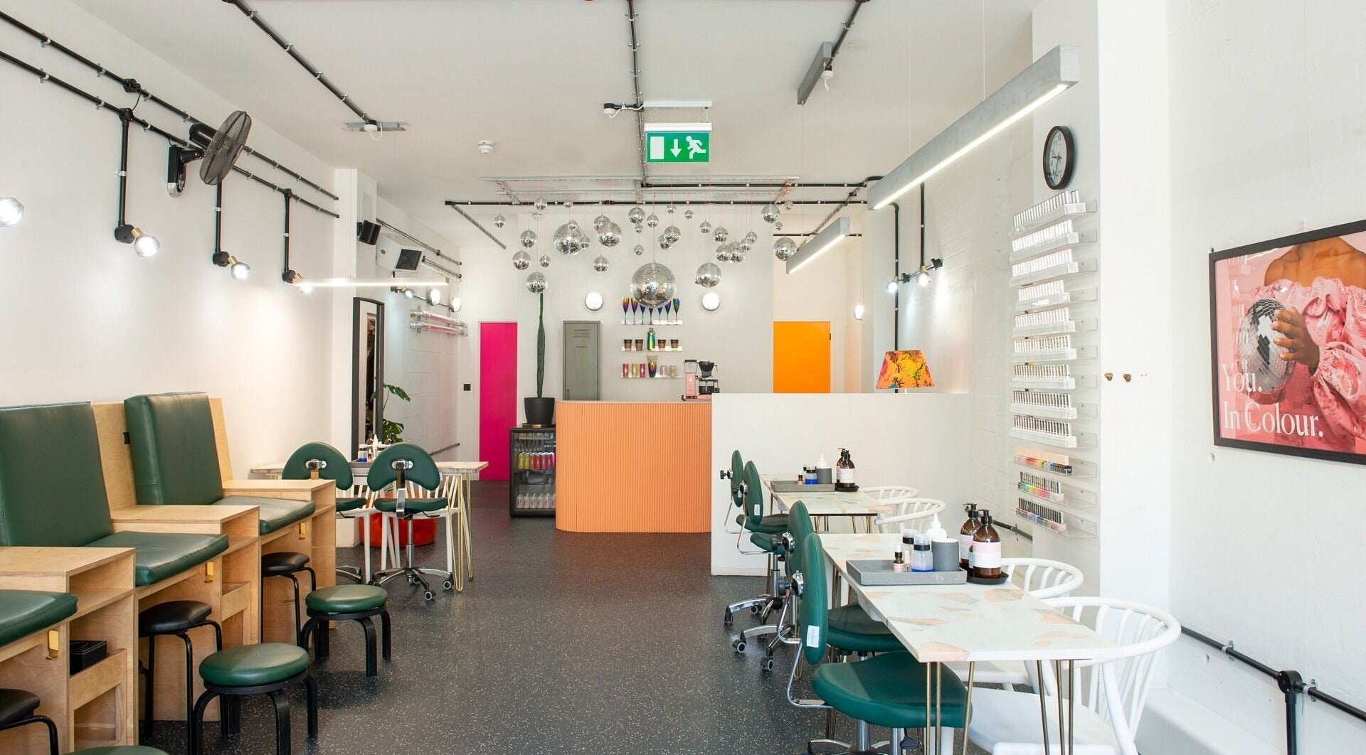 Interior of Shoreditch Nails Dalston, London, England, GB featuring chic decor and modern nail stations.