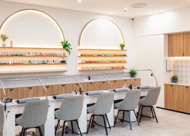 Chic interior of Ace Nails & Beauty Redfern, Redfern, New South Wales, AU showcasing nail stations and elegant decor.