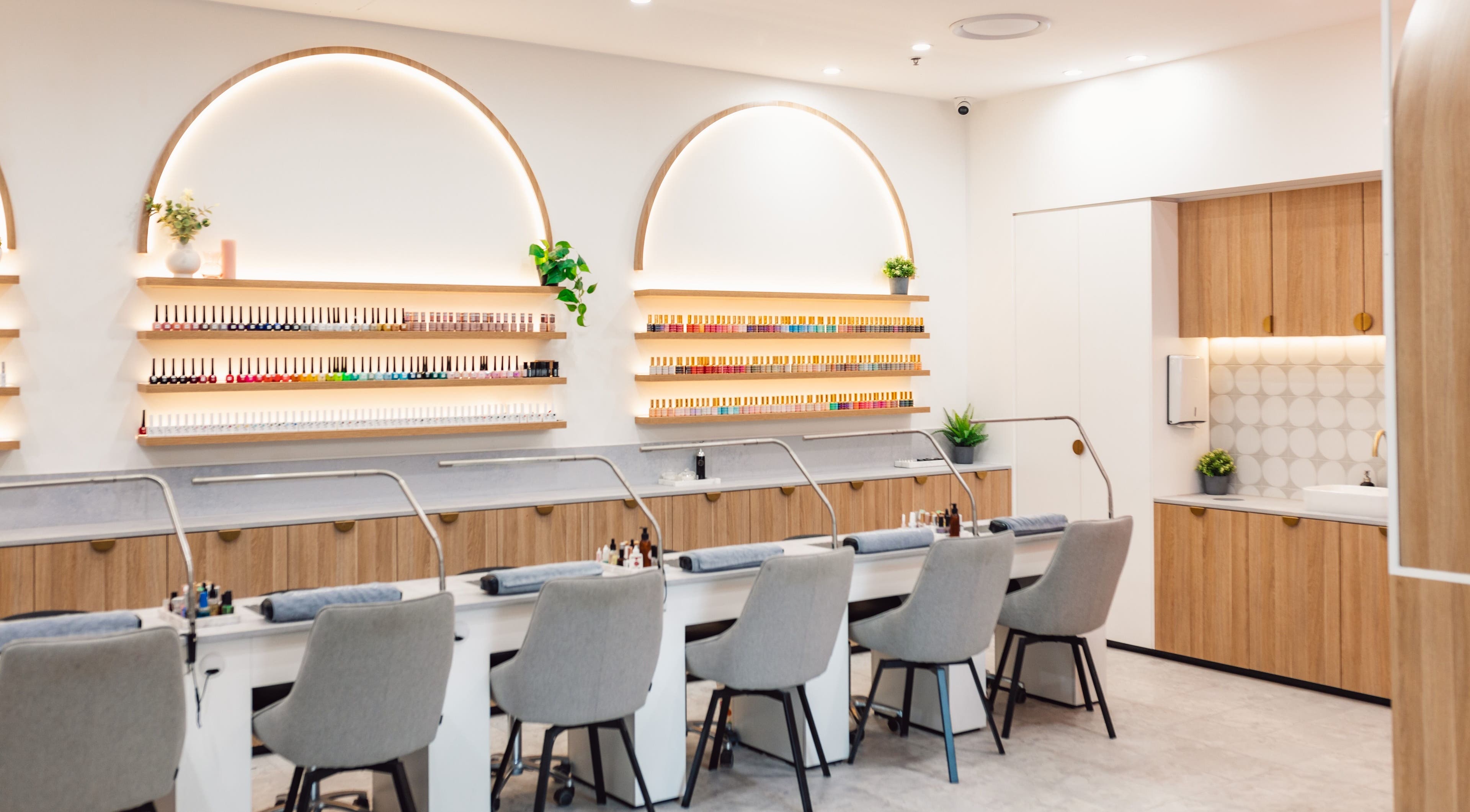 Chic interior of Ace Nails & Beauty Redfern, Redfern, New South Wales, AU showcasing nail stations and elegant decor.